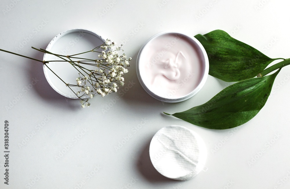 Organic skincare products on minimalistic background with copy space