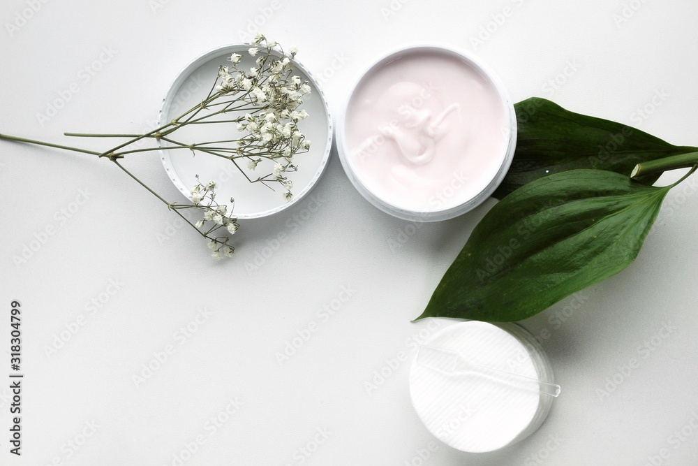 Organic skincare products on minimalistic background with copy space