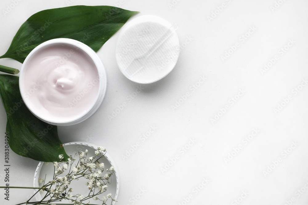 Organic skincare products on minimalistic background with copy space