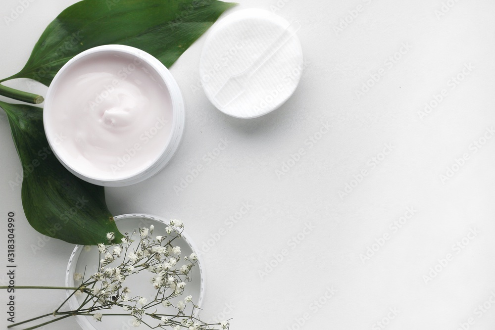 Organic skincare products on minimalistic background with copy space