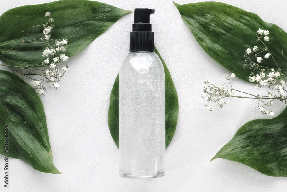 Organic skincare products on minimalistic background with copy space