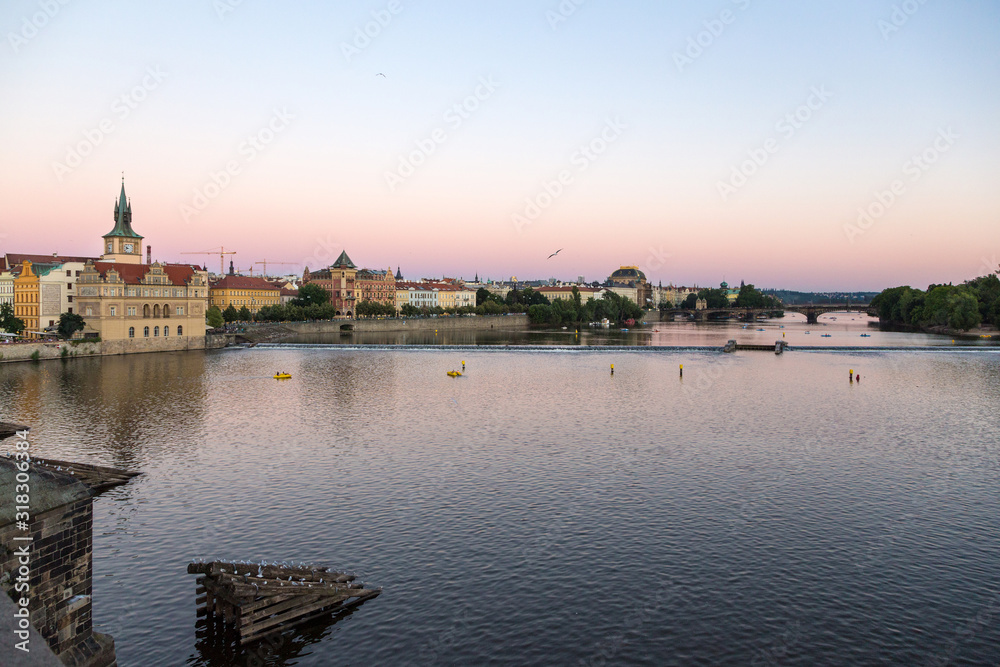Prague and the Vltava river at sunset time