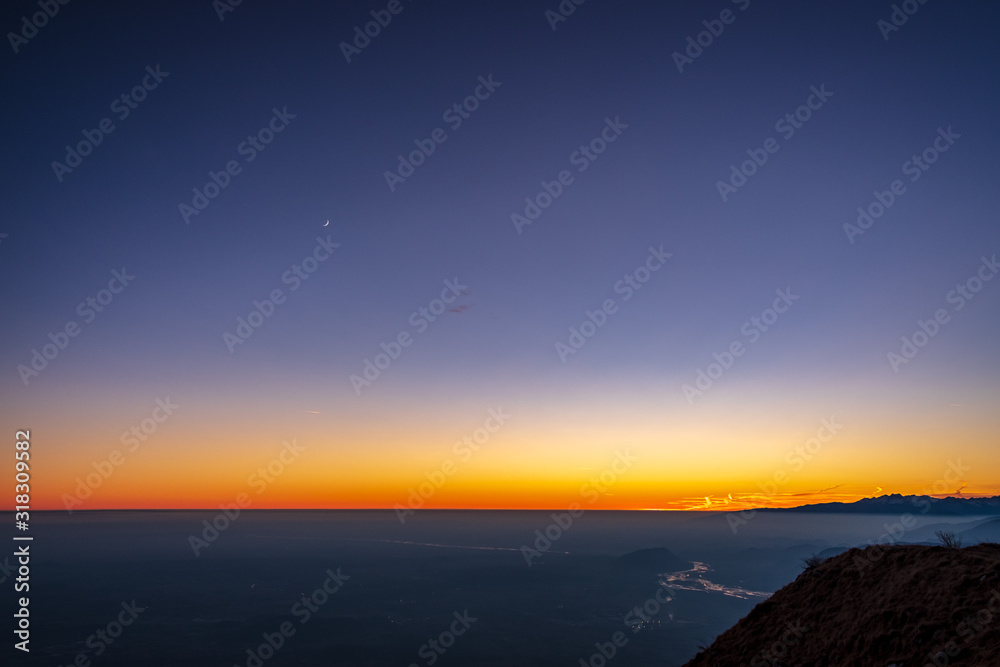 Winter sunset from an alpine peak of Friuli-Venezia Giulia Winter sunset from an alpine peak of Friuli-Venezia Giulia