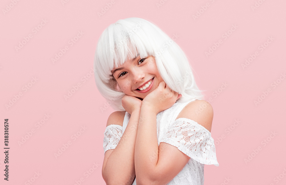 Cheerful teen girl in white wig Cheerful teen girl in white wig