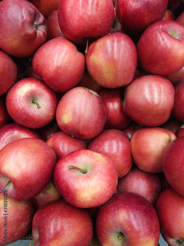 ripe but not very beautiful red-yellow apples of small size and on the counter ripe but not very beautiful red-yellow apples of small size and on the counter