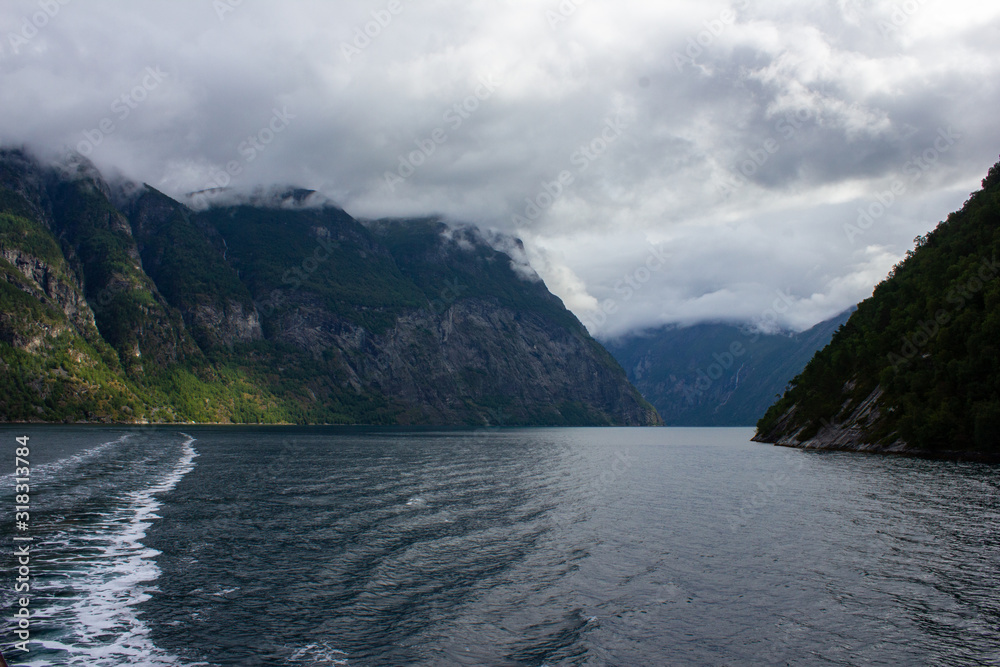 View of Geiranger fjord and mountains from a boat
