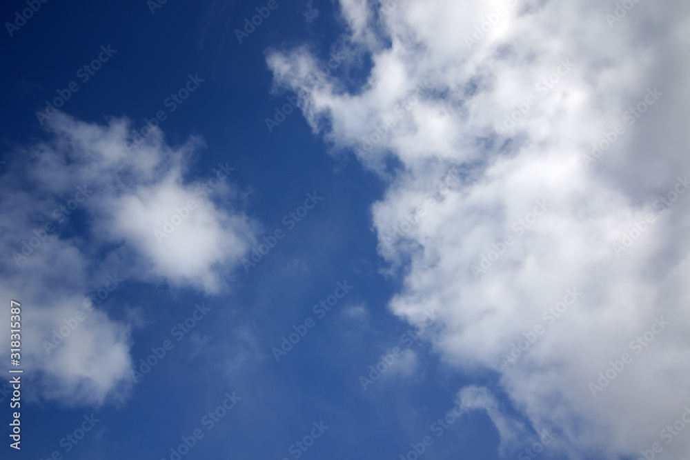 background of white fluffy cumulus clouds background of white fluffy cumulus clouds
