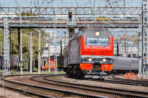 Passenger train approaches to the station. Moscow. Russia.