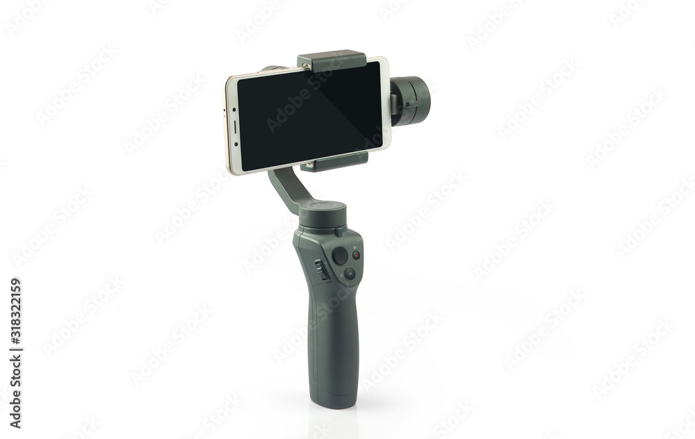Hand holding gimbal with smartphone Hand holding gimbal with smartphone