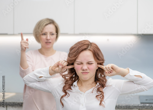 Photos The teenage girl closed her eyes and closed her ears
