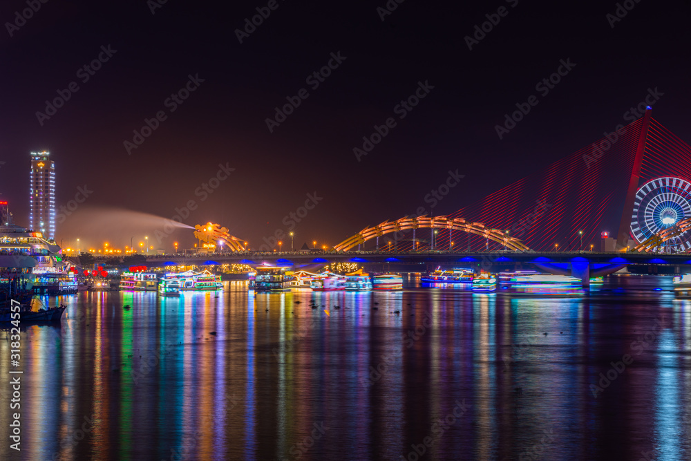 Dragon Bridge (Cau Rong) illuminated at night, Da Nang Vietnam