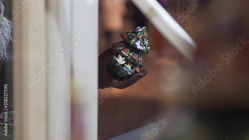 Person Buying Souvenirs in a Gift Shop photo