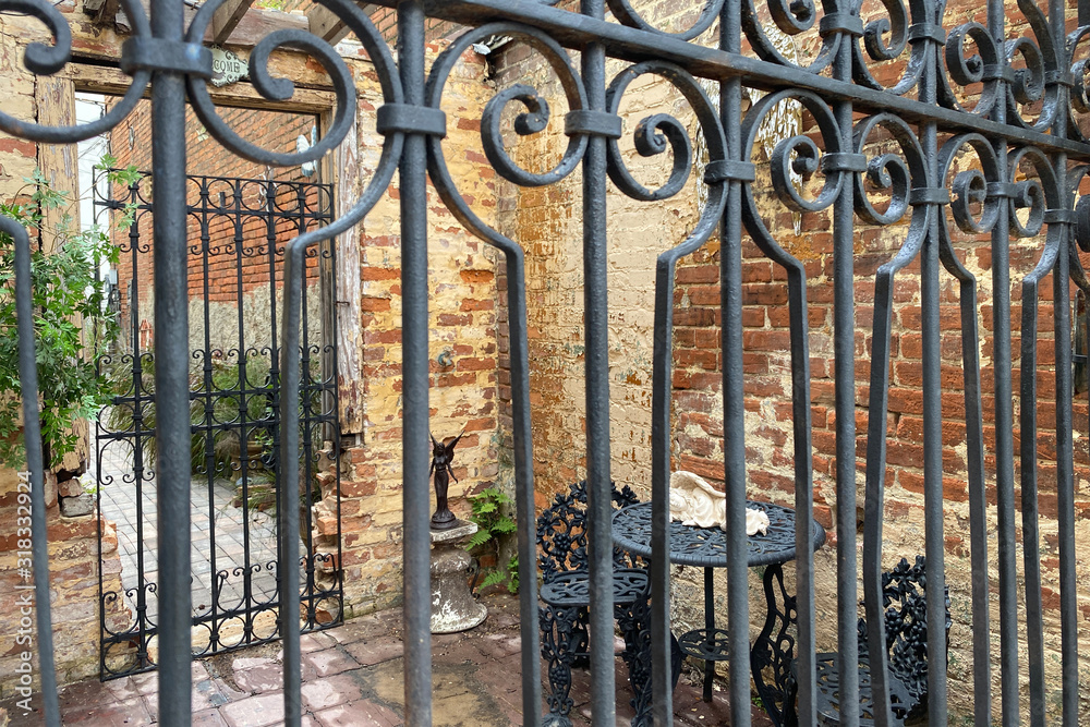 view through wrought iron gate garden sanctuary view through wrought iron gate garden sanctuary