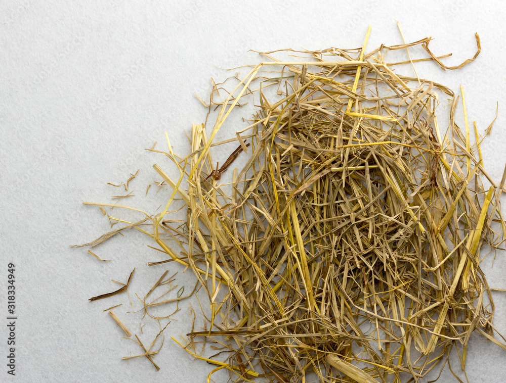 Straw isolated on white background. Top view.