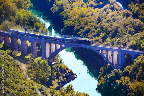 famous solkan bridge with the train