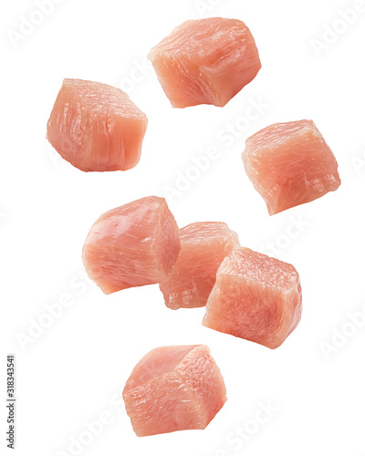 Falling Raw chicken, fillet, isolated on white background, clipping path, full depth of field