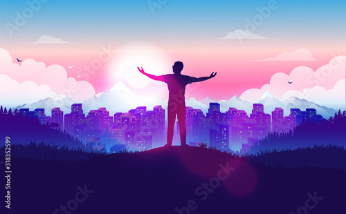 Fotografija Feeling free - man standing on hill above city, with hands raised enjoying the freedom