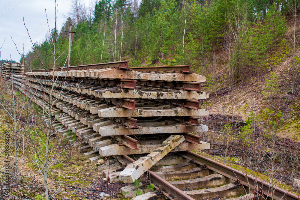 big pile of old abandoned rails and sleepers big pile of old abandoned rails and sleepers