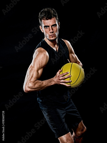 caucasian young basketball player manisolated black background © snaptitude
