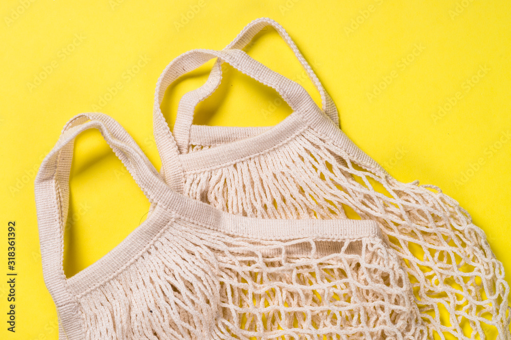 Fototapeta premium Mesh bag for zero waste shopping on color background.