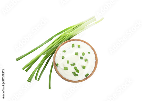 Slika na platnu Fresh sour cream with onion on white background, top view