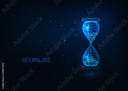 Futuristic glowing low polygonal hourglass isolated on dark blue background.