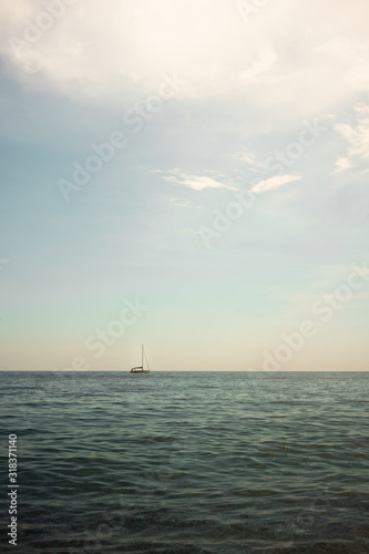 yacht in the sea at sunset (Sicily, Italy) © Delyan