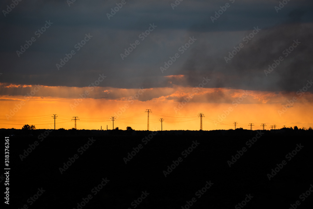 gold sunset and electical wires big field minimalistic clouds smog urban space for text gold sunset and electical wires big field minimalistic clouds smog urban space for text