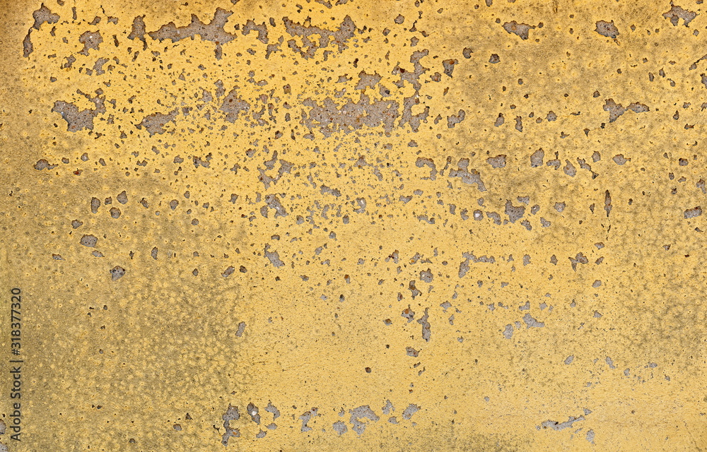 Yellow Peeling Paint on Dirty Morter Wall