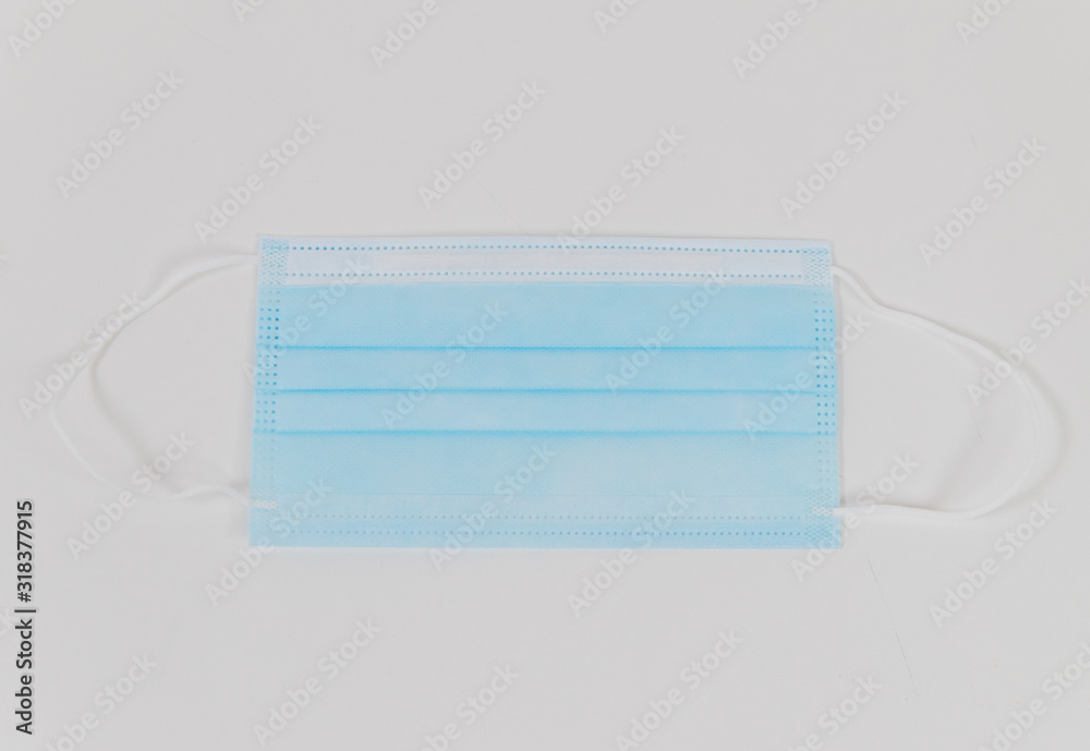 Blue protective mask isolated closeup - Image Blue protective mask isolated closeup - Image