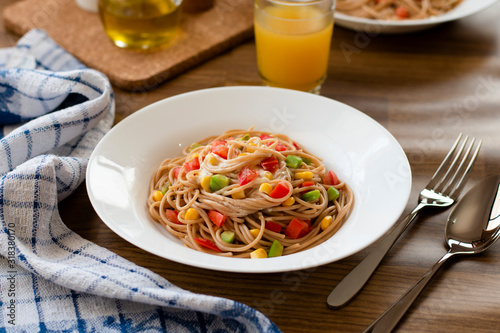Delicious vegan pasta salad with tahini dressing. Noodles with quinoa or whole wheat pasta.
