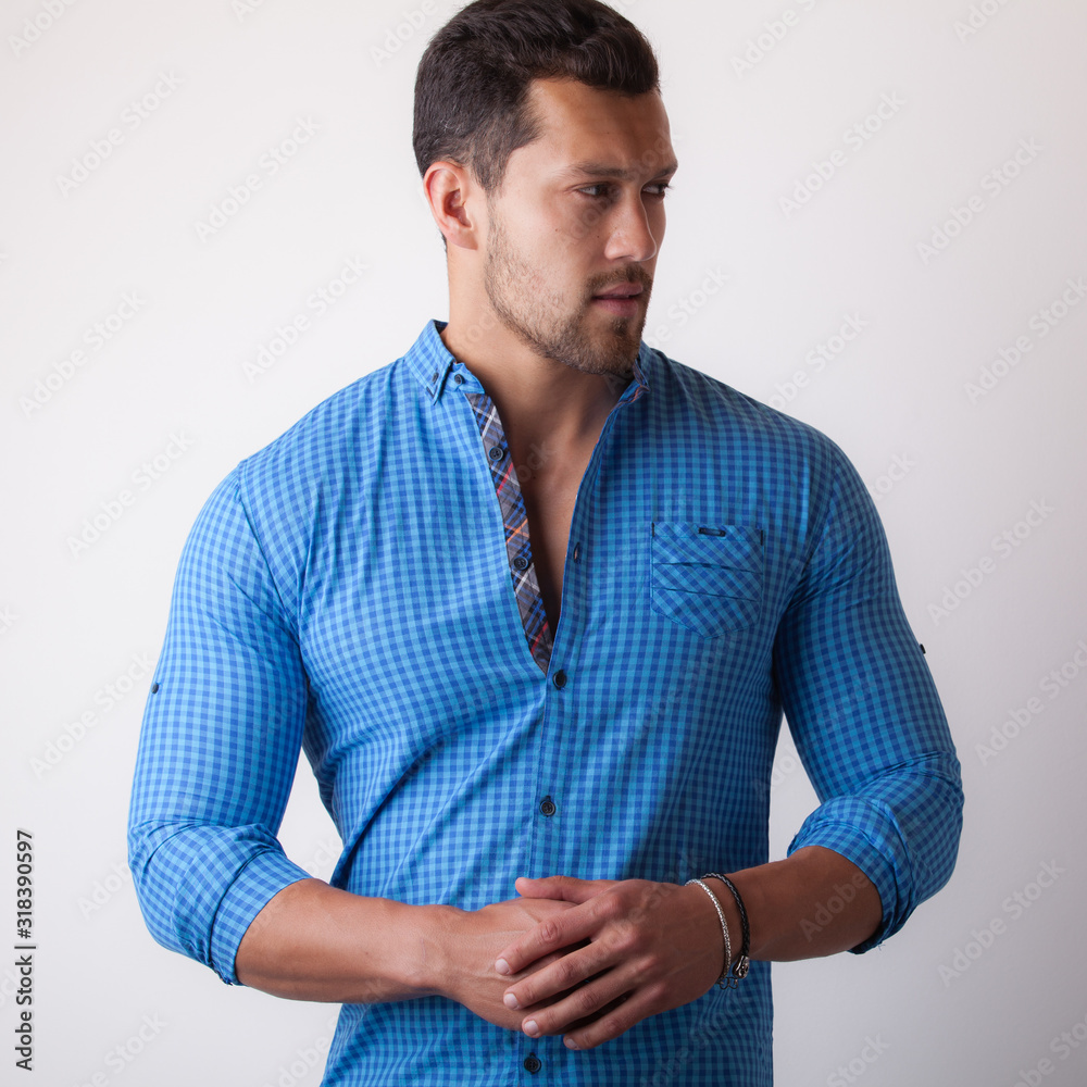 Handsome young elegant man studio portrait. Handsome young elegant man studio portrait.