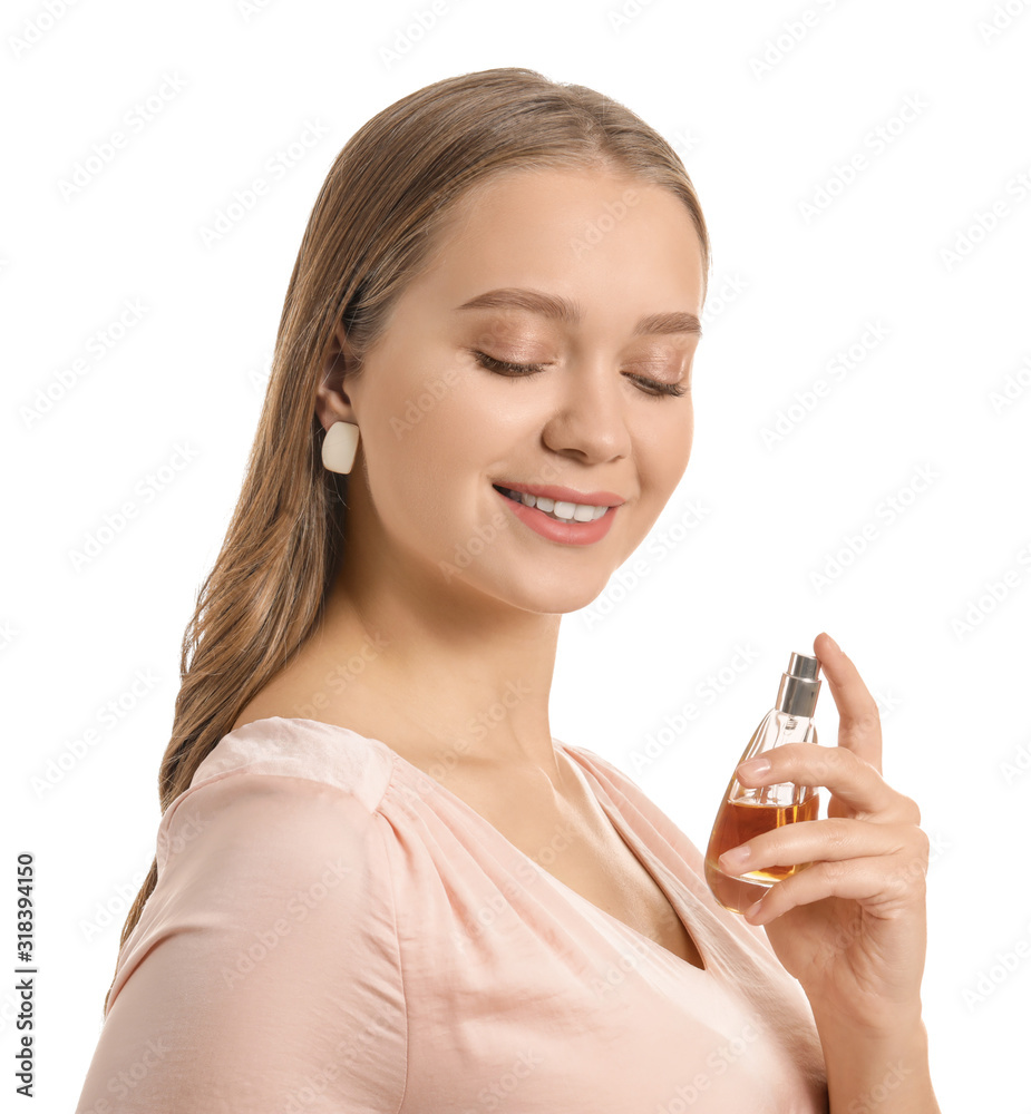 Beautiful young woman with bottle of perfume on white background Beautiful young woman with bottle of perfume on white background