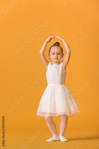 Cute little ballerina on co...