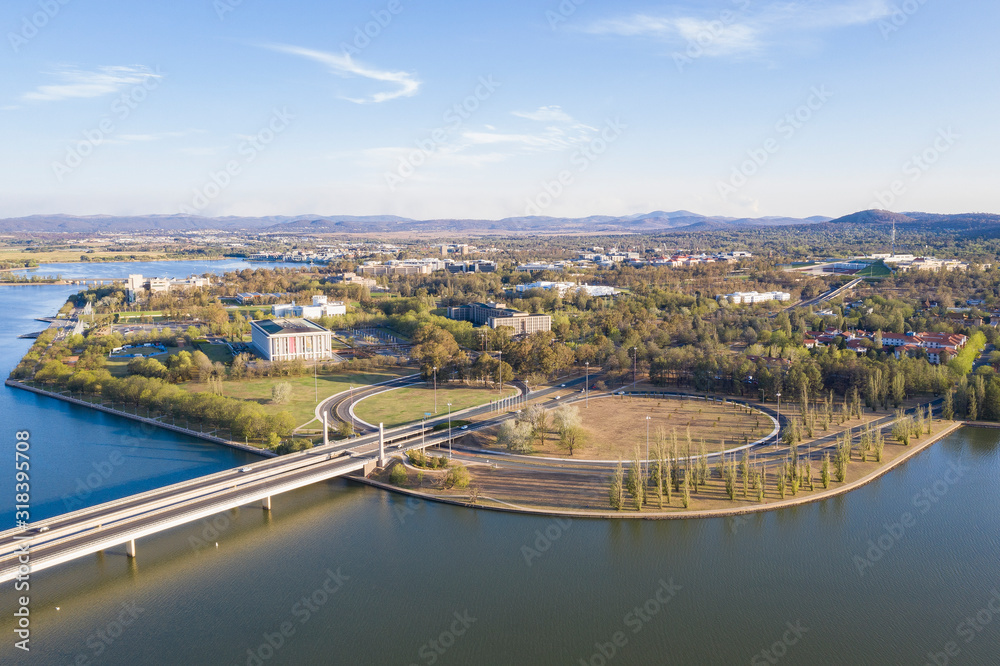 Panoramic aerial view of Lake Burley Griffin and Commonwealth Bridge in Canberra, the capital of Australia