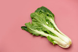 Fresh cabbage on a pink background