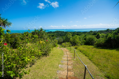 Path way to the stone monoliths  blue ocean  green hill  tropical  Ngarchelong  Palau  Pacific