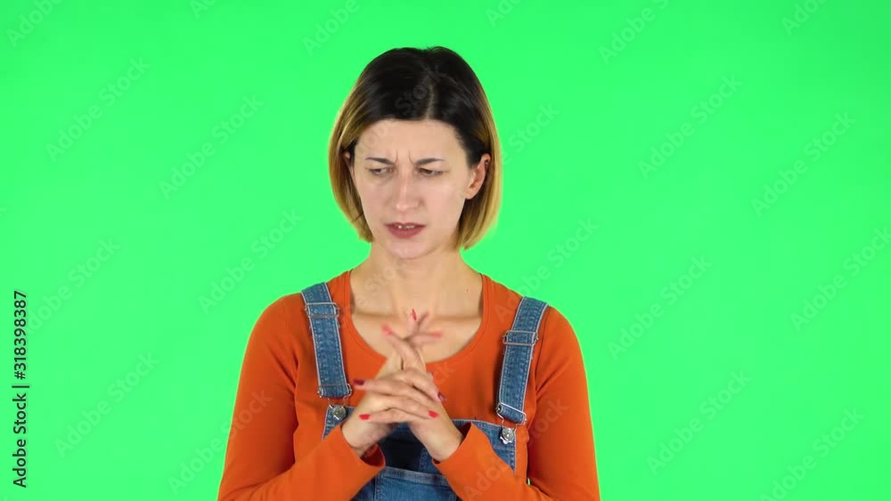 Woman thinks about something, no idea. Green screen Woman thinks about something, no idea. Green screen