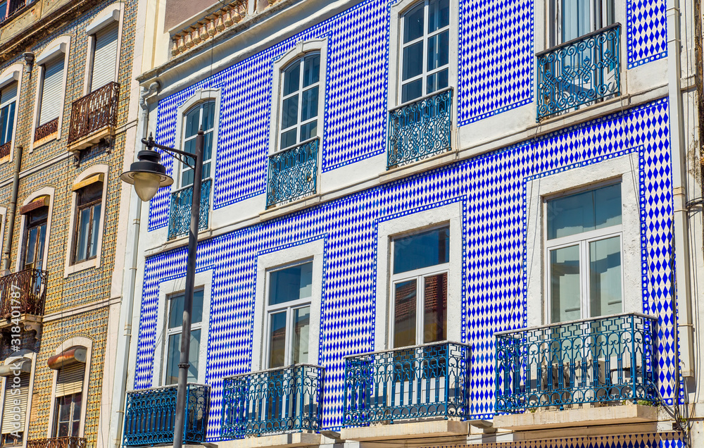Naklejka premium Typical Portuguese architecture and colorful buildings of Lisbon historic city center