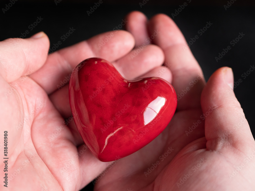 Red heart in the hand. St. Valentine's Day concept idea Red heart in the hand. St. Valentine's Day concept idea