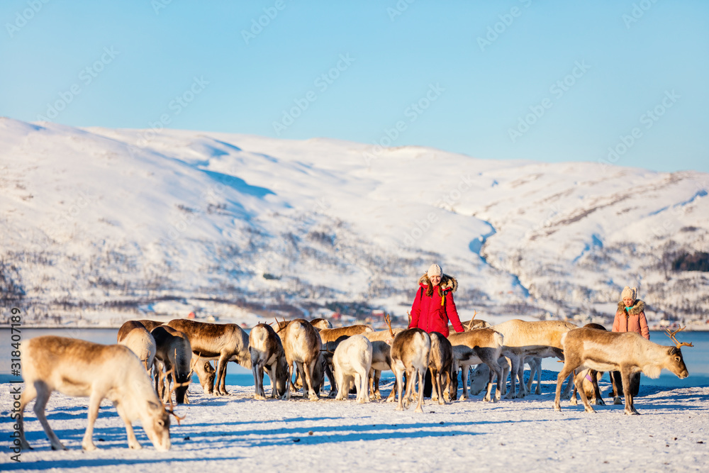 Family with reindeer