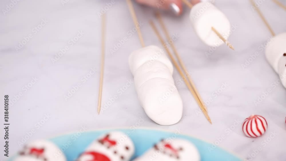 Step by step. Making marshmallow snowman and reindeer on sticks hot chocolate toppers for food gifting. Step by step. Making marshmallow snowman and reindeer on sticks hot chocolate toppers for food gifting.