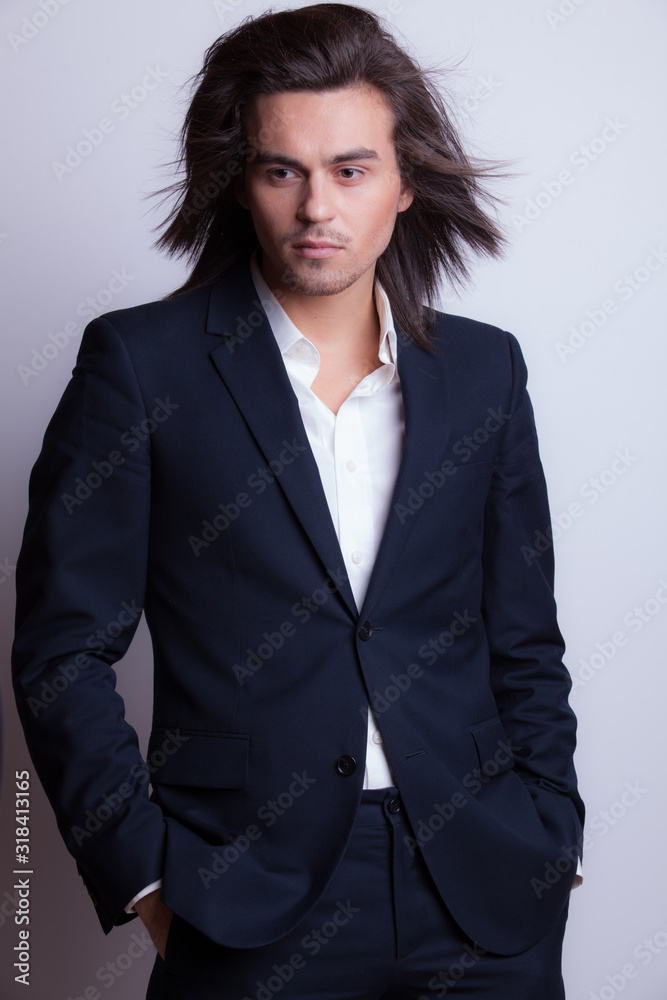 Handsome young elegant man studio portrait. Handsome young elegant man studio portrait.