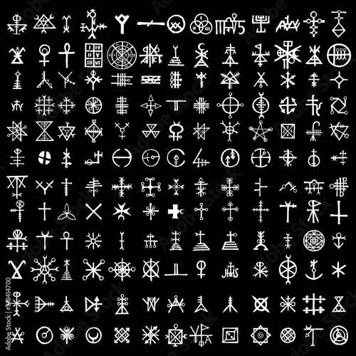 Big set of esoteric symbol and alphabet on the theme of mysticism and magic. Inspired by super natural religion and the occultism. Medieval Masonic imaginary manuscript with letters sketches. Vector.