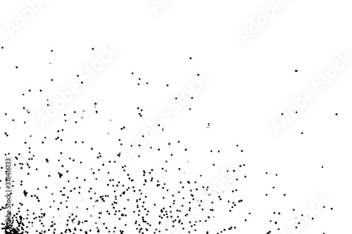 Abstract grainy texture isolated on white background. Top view. Dust, sand blow or bread crumbs. Silhouette of food flakes such as salt or almond or wheat flour spread on the flat surface or table.