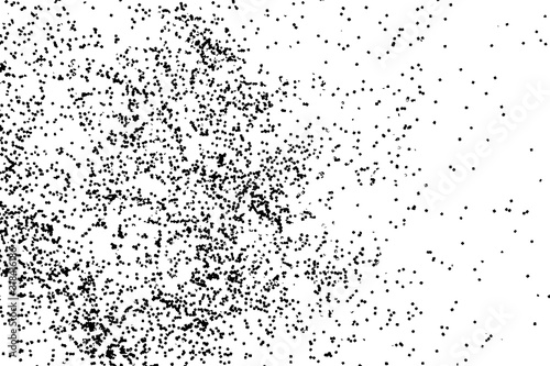 Abstract grainy texture isolated on white background. Top view. Dust, sand blow or bread crumbs. Silhouette of food flakes such as salt or almond or wheat flour spread on the flat surface or table.
