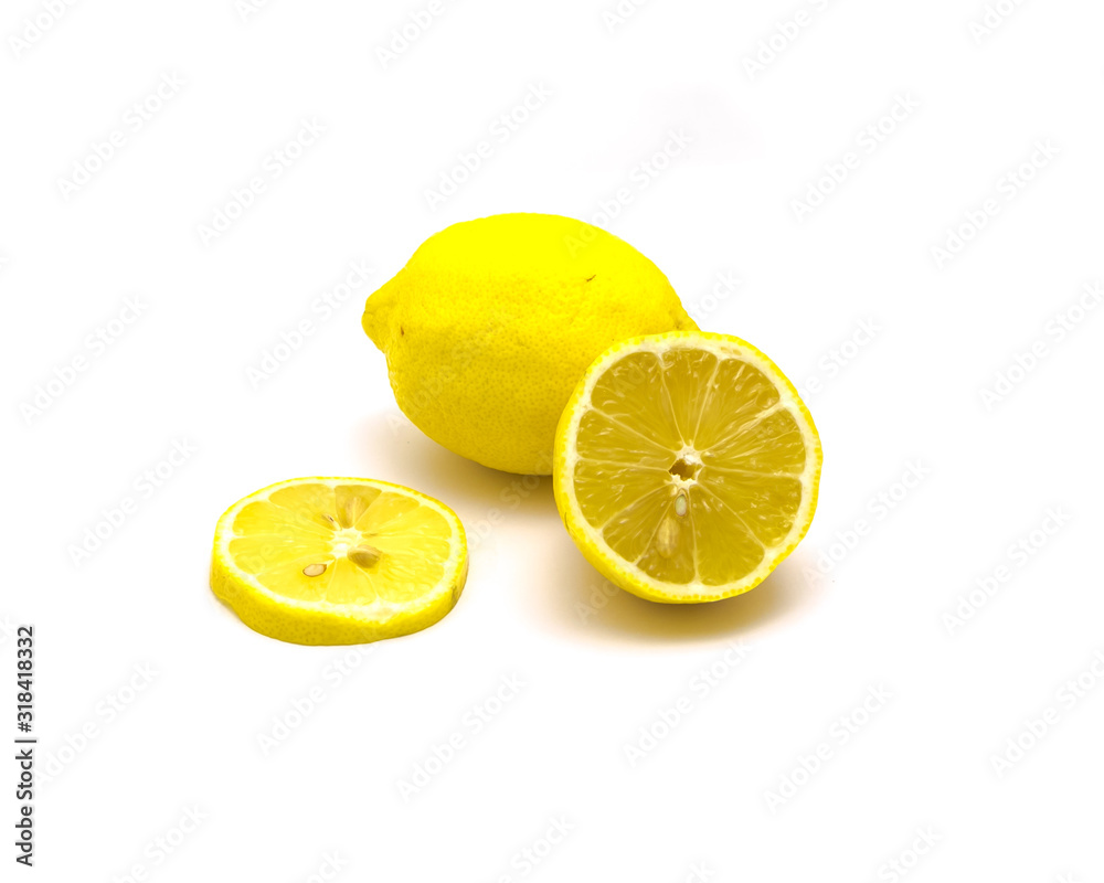 Studio shot one lemon with fresh slice cuts isolated on white Studio shot one lemon with fresh slice cuts isolated on white