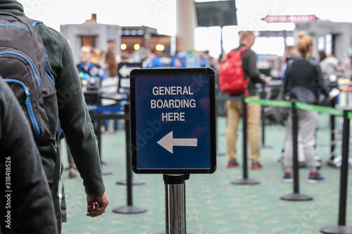 Posted sign in an airport read "General boarding here" to direct passenger for TSA security check