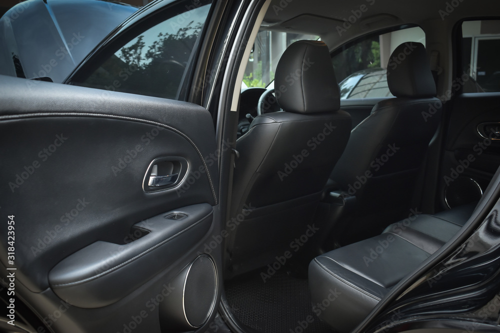 black leather of back seat interior inside modern vehicle car automobile