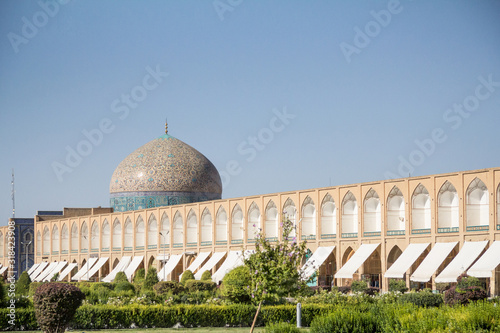 Sheikh Lotfollah Mosque seen from the Naqsh-e Jahan Square, one of the symbols of the city in Isfahan, Iran. It is a Safavid mosque from the 17th century, and a shia muslim islamic landmark photo